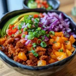 A side view of a Kürbis Taco Bowl with vibrant colors and textures.