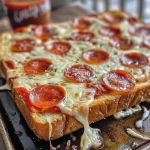 Close-up view of a Texas Toast Pizza topped with pepperoni and cheese.